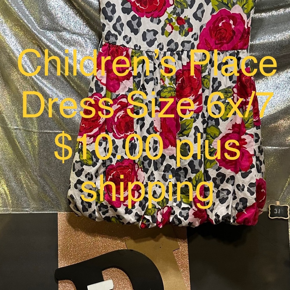 Children’s Place dress while with black and red floral